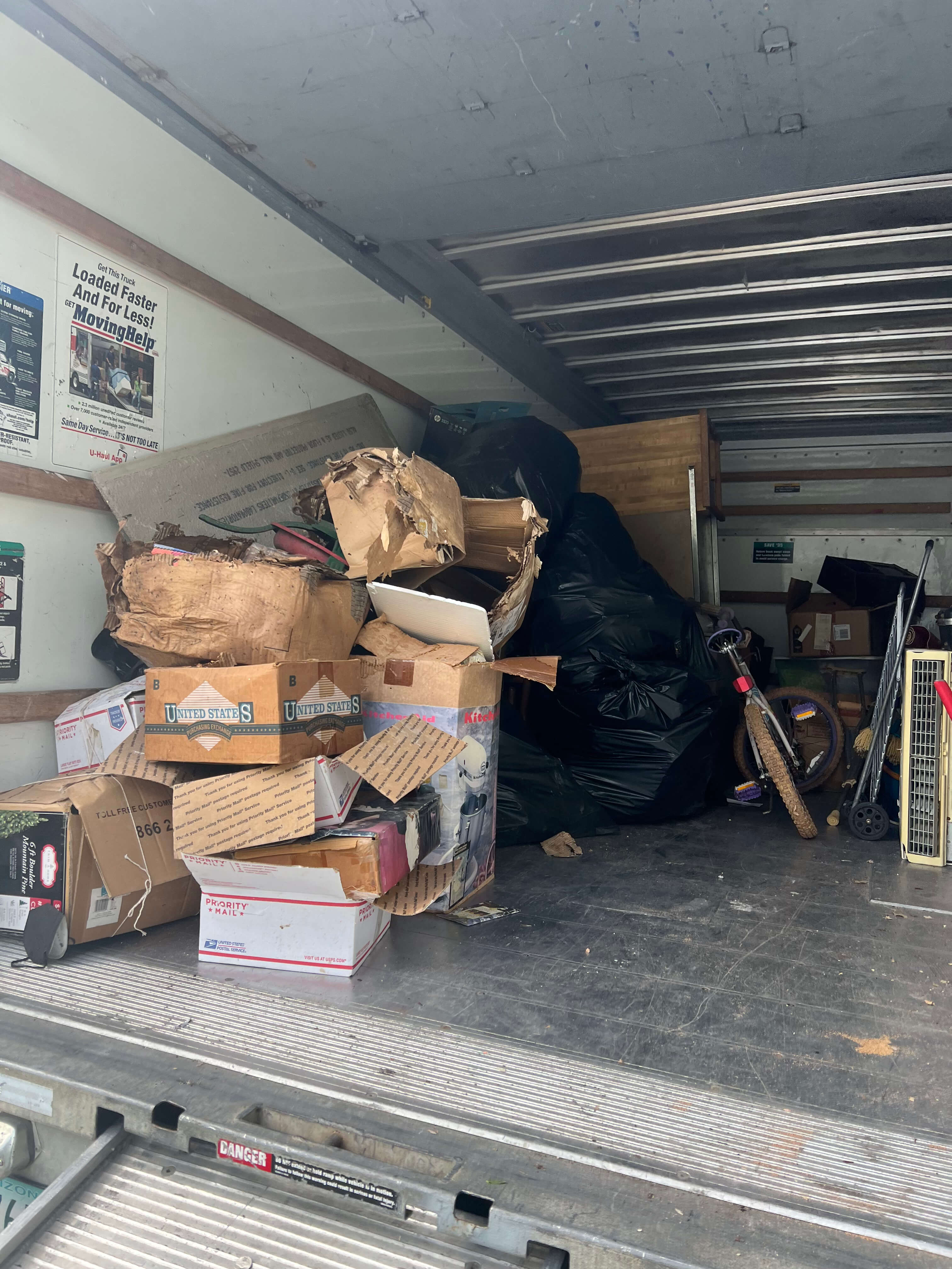 junk removal truck loaded miami